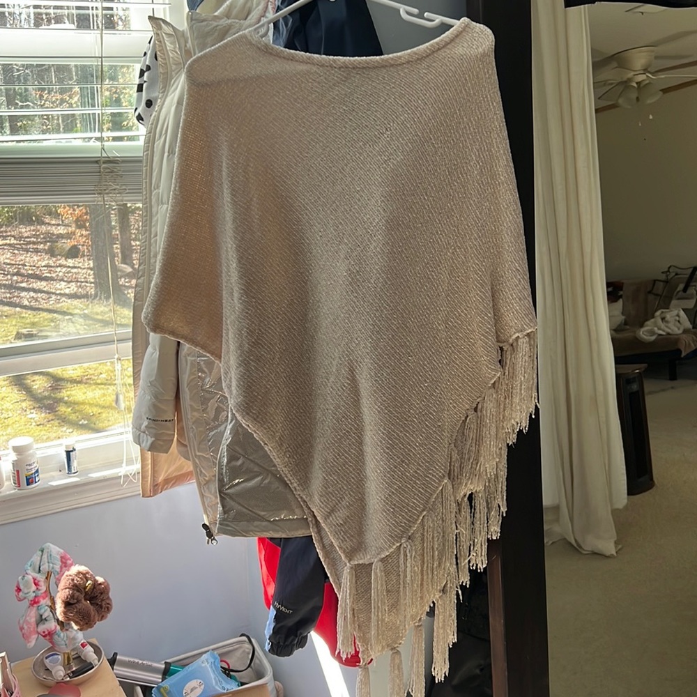 cream poncho sweater